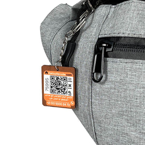 Gray waist pack with a beehive-inspired shape and 4 waterproof pockets, constructed from sturdy Oxford fabric.