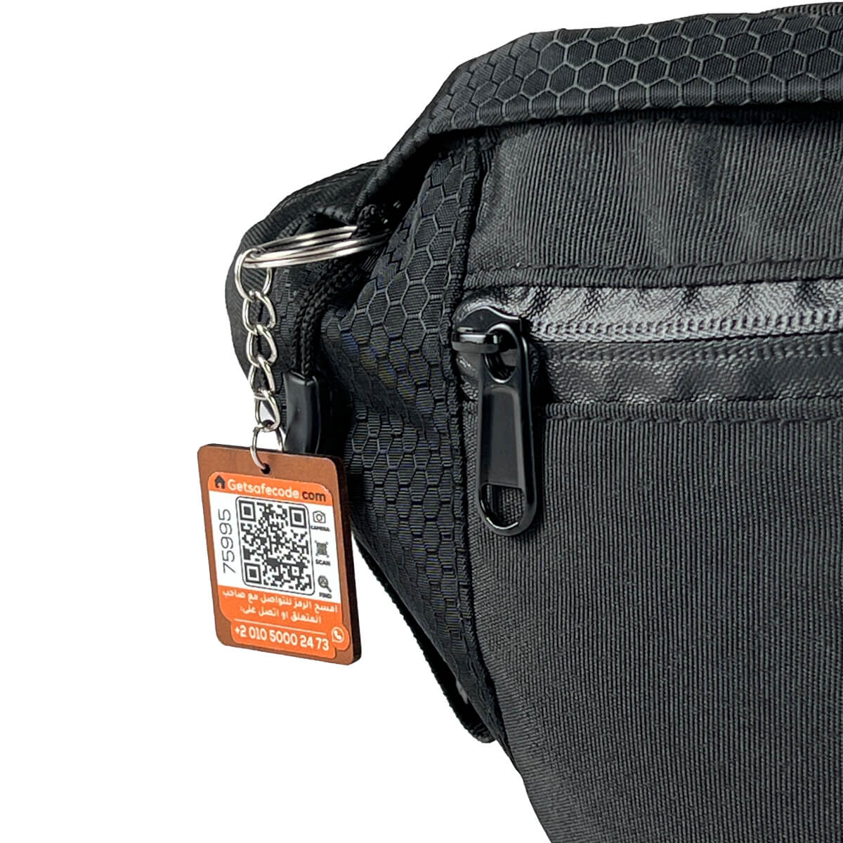 Black Beehive waist bag shown with the optional SafeCode QR tag (sold separately, EGP 50). FashionPyramid