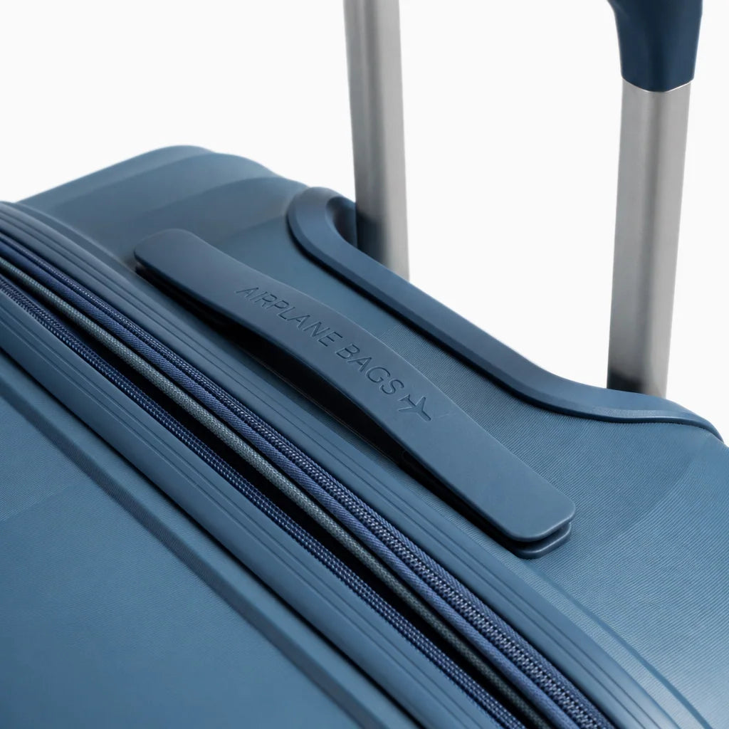 Fashion Pyramid Explore Trolley in blue – top handle and trolley handle base detail