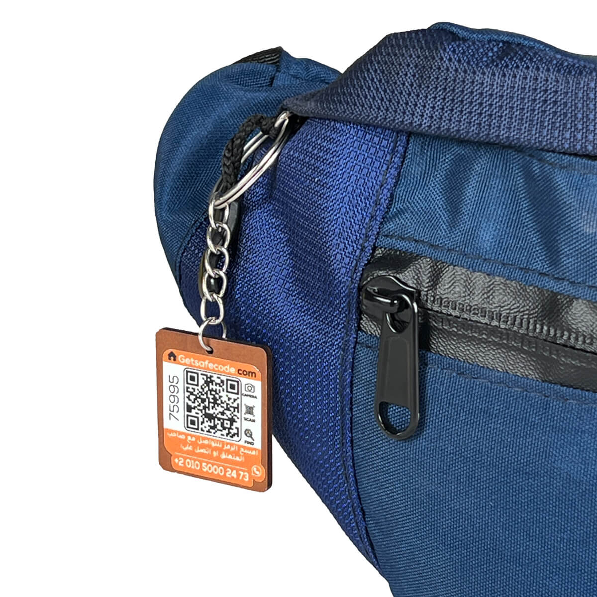 Navy Beehive waist bag shown with the optional SafeCode QR tag (sold separately, EGP 50). FashionPyramid