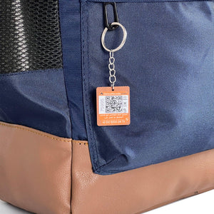 Navy Pyramid Backpack shown with the optional SafeCode QR tag (sold separately, EGP 50). Fashionpyramid