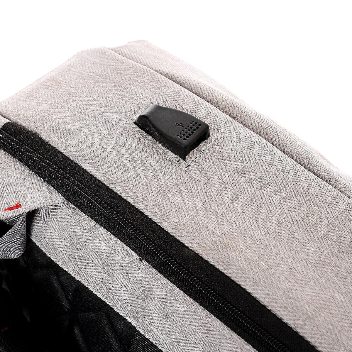 The backpack contains an USB for charging.