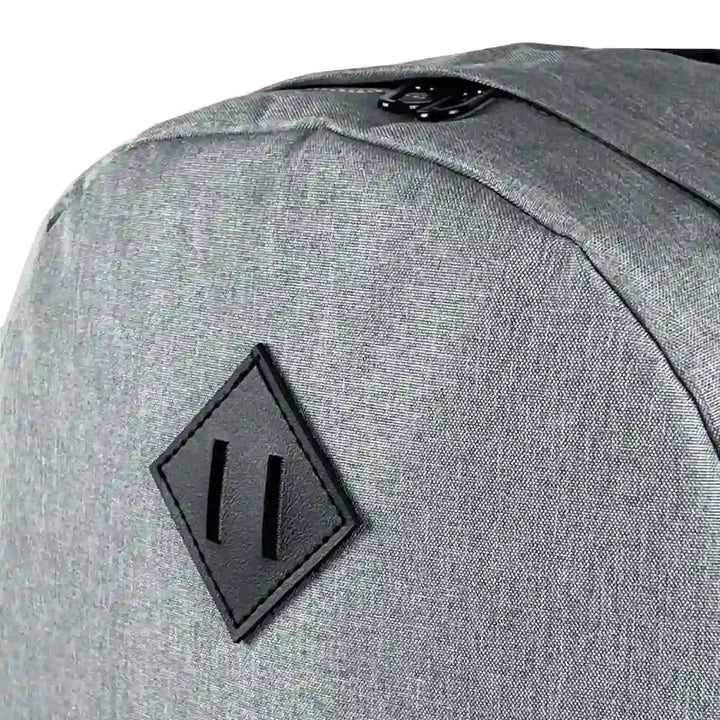 Gray backpack with heavy-duty zippers and straps for extreme sports.